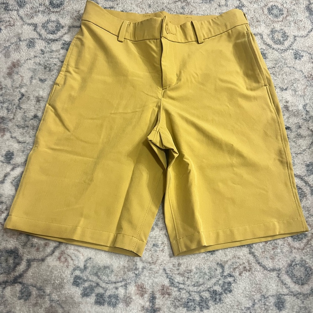 Nike Kids mustard colored hybrid flex golf shorts